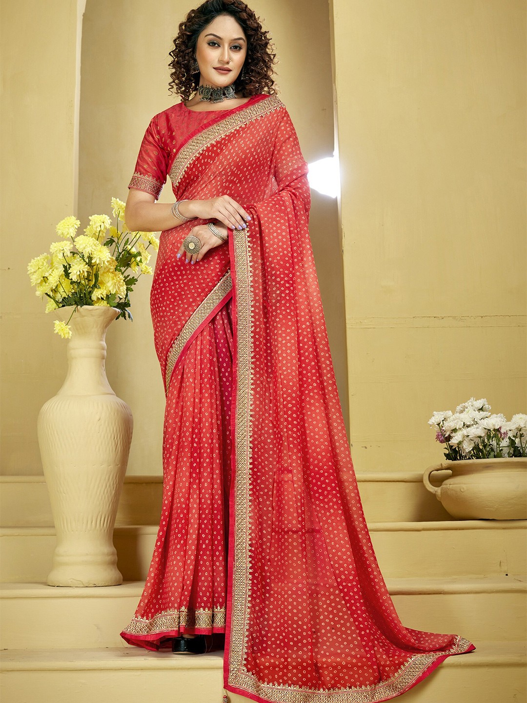 

Triveni Bandhani Printed Embroidered Pure Georgette Saree, Orange