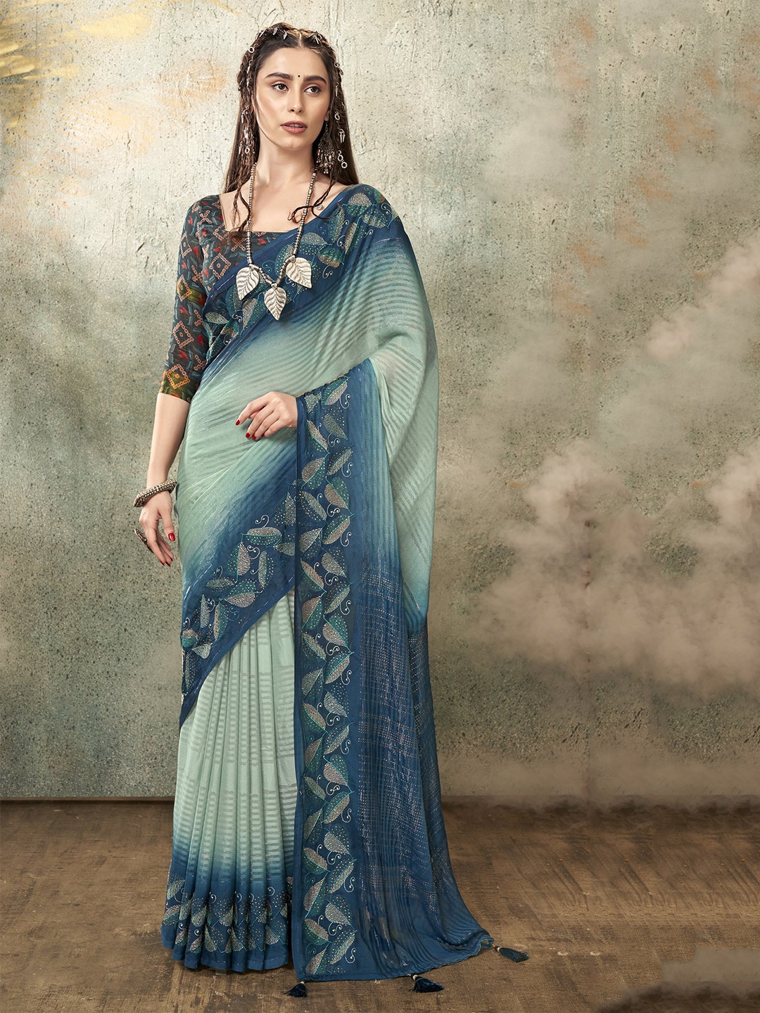 

Triveni Striped Embroidered Pure Georgette Saree, Blue