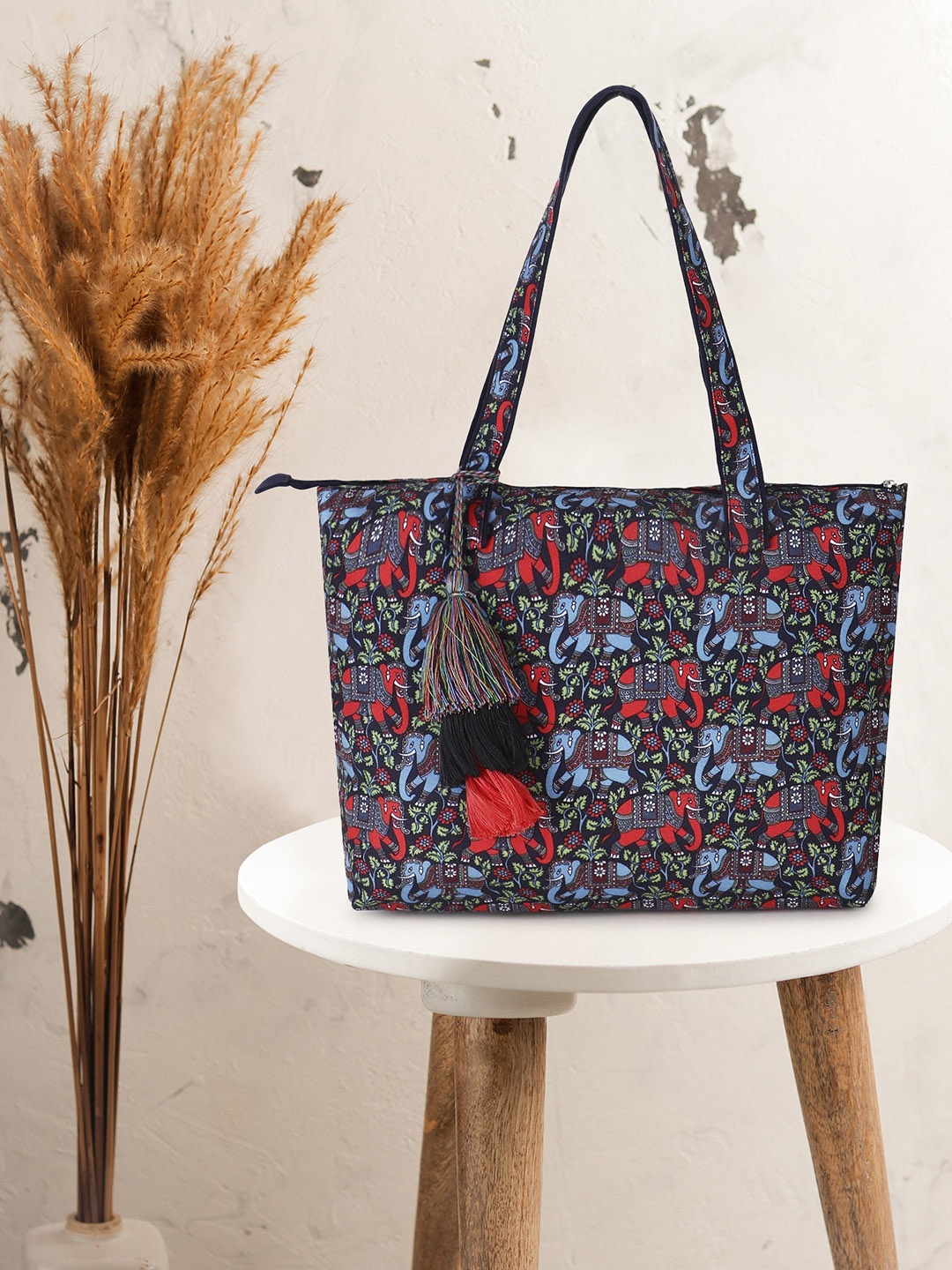 

Anekaant Navy Blue Embellished Structured Shoulder Bag with Tasselled