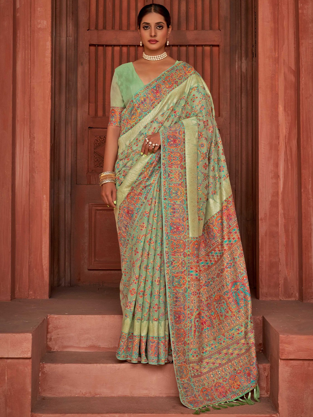 

Mitera Green & Orange Floral Woven Design Banarasi Saree