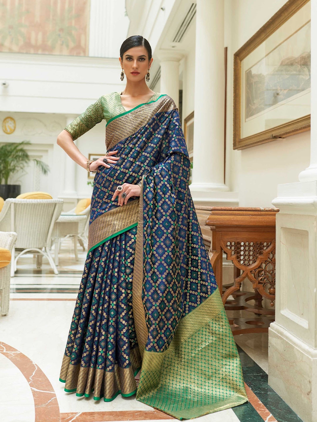 

Mitera Navy Blue & Blue Woven Design Zari Silk Blend Patola Saree