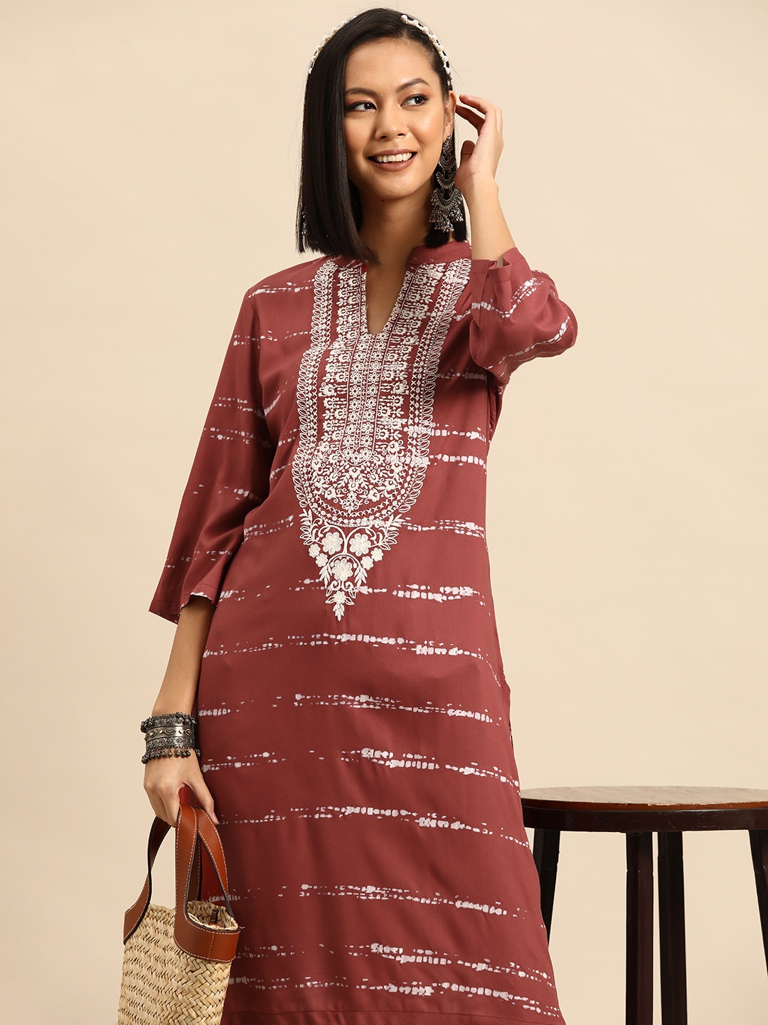 

Sangria Women Ethnic Motifs Printed Straight Kurta with Pocket, Rust