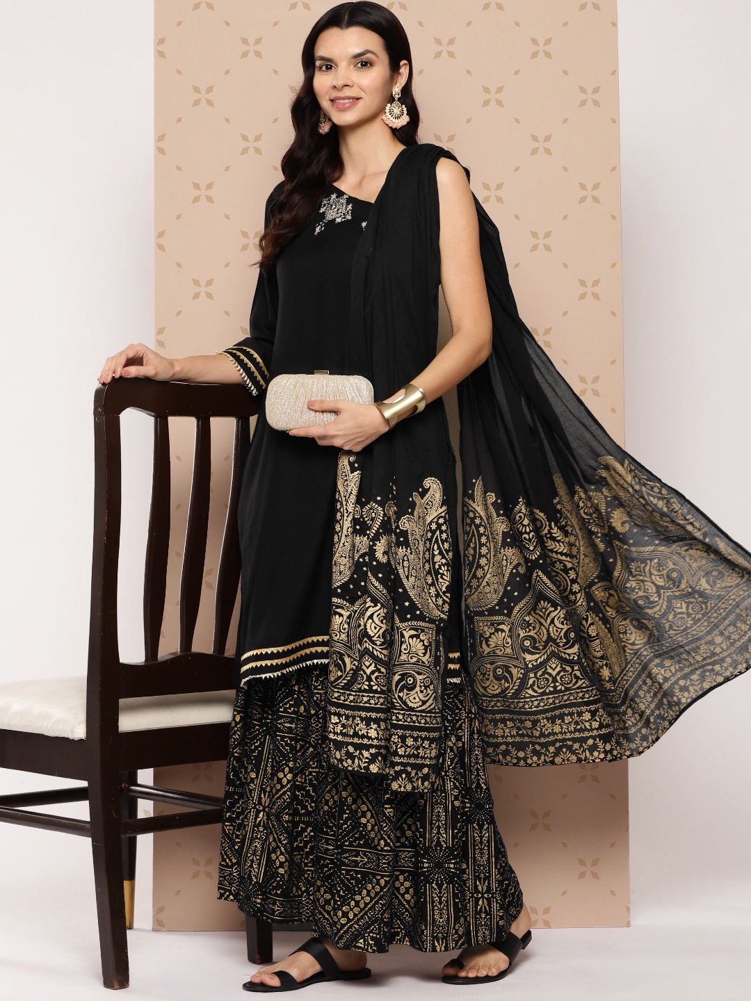 

Sangria Motifs Zari Embroidered Asymmetric Neck Kurta with Foil Print Sharara & Dupatta, Black