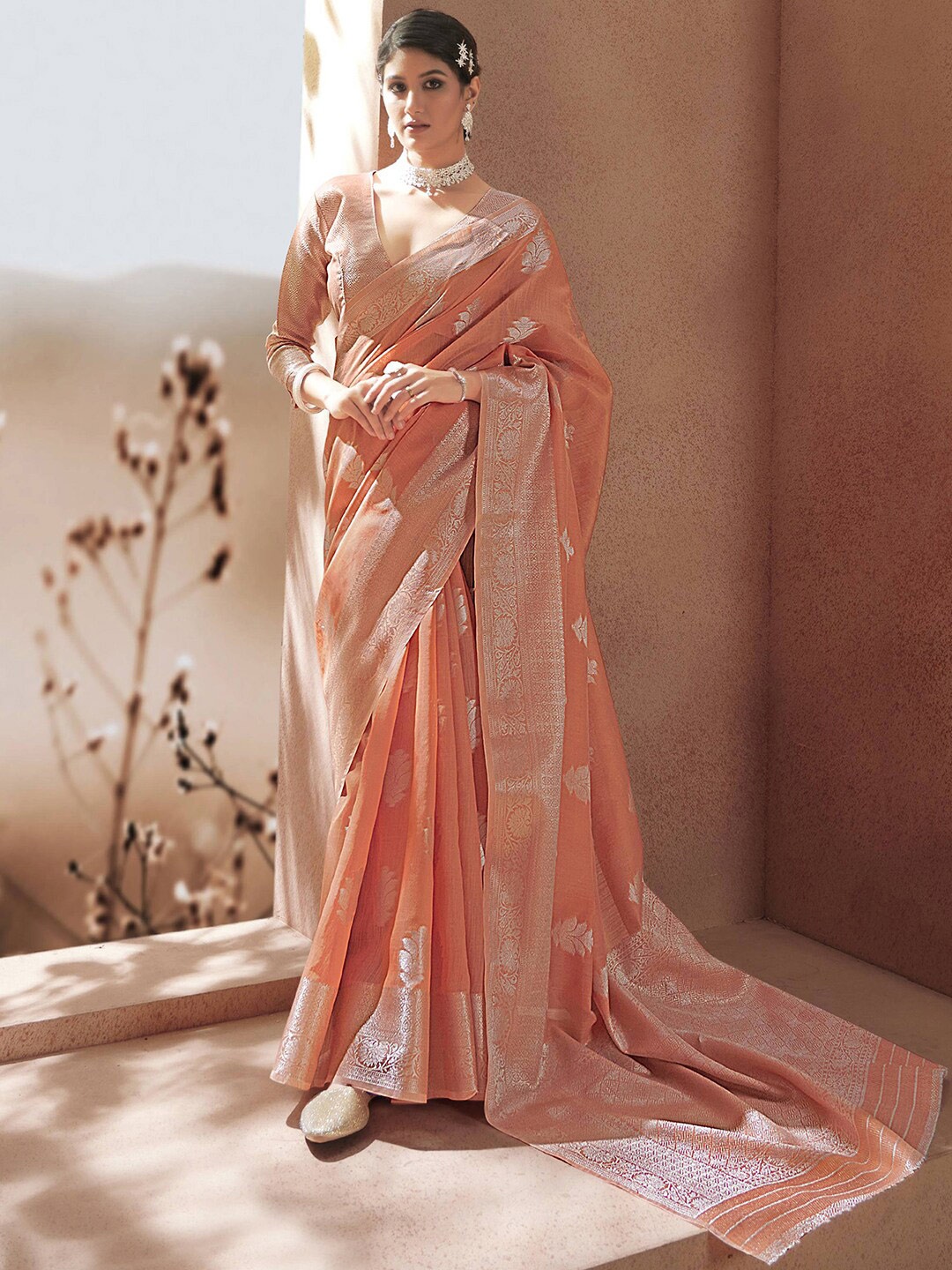 

Satrani Peach & Silver Woven Design Zari Saree