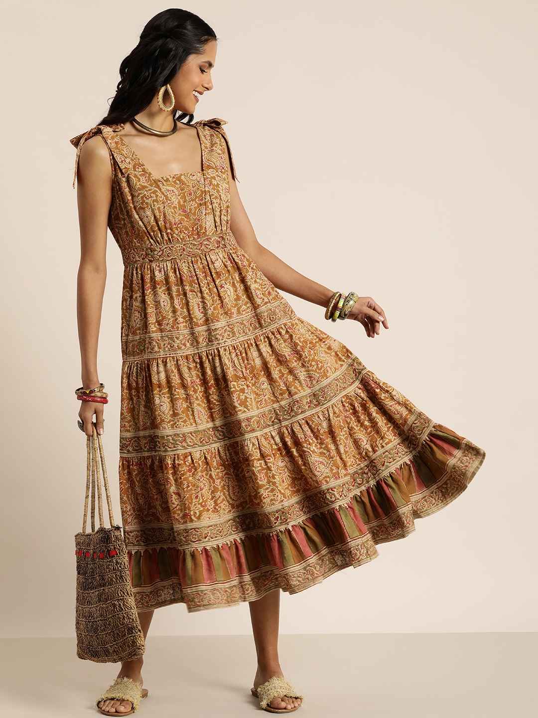 

Taavi Ethnic Motifs Printed A-Line Kalamkari Ethnic Dresses, Brown