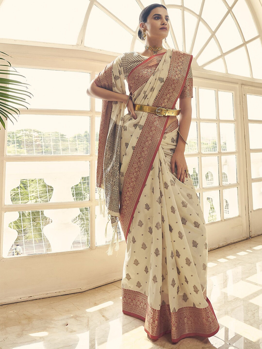 

Mitera Cream-Coloured & Red Woven Design Zari Art Silk Banarasi Saree