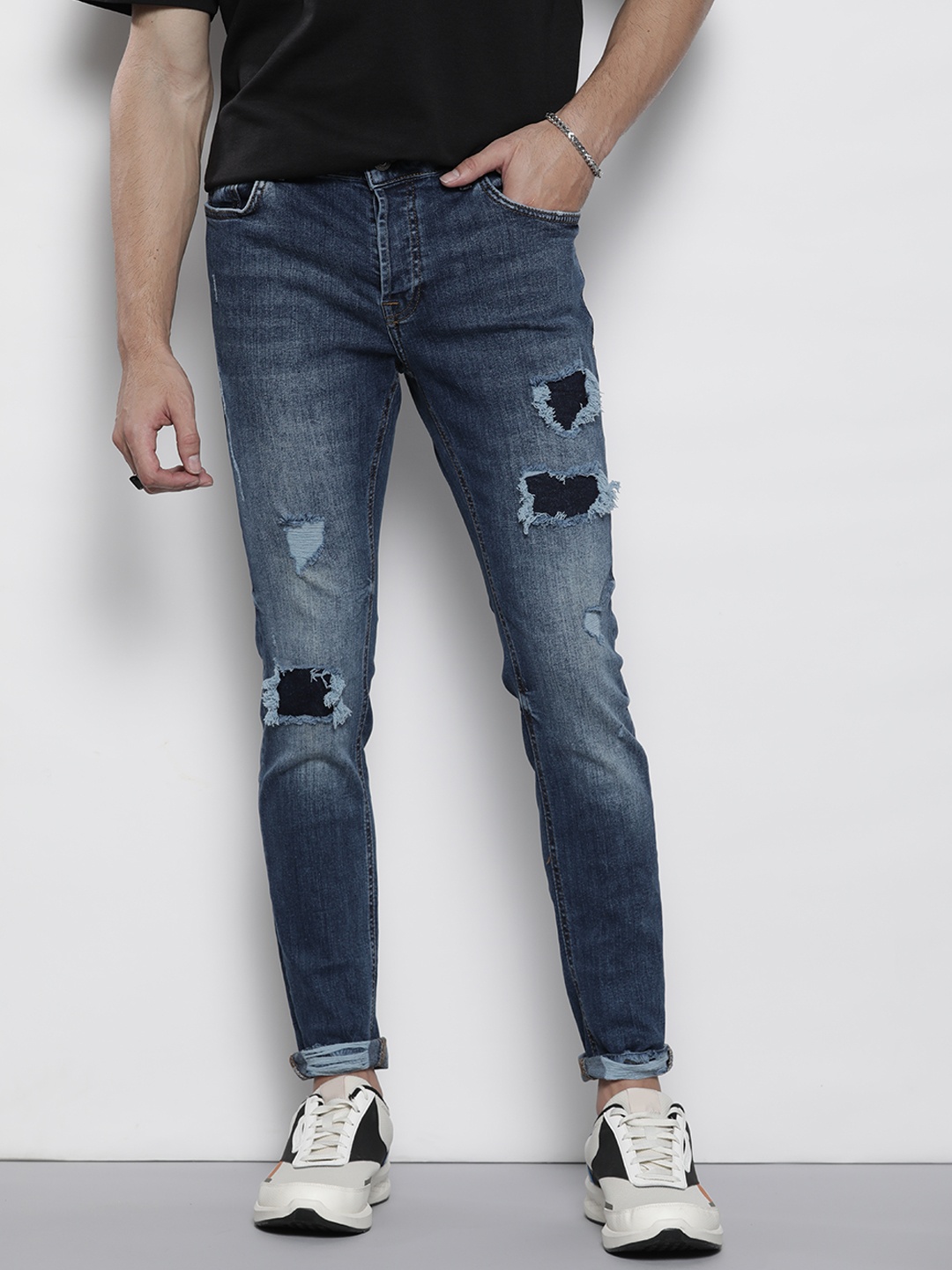 

boohooMAN Super Skinny Fit Mildly Distressed Light Fade Jeans, Blue