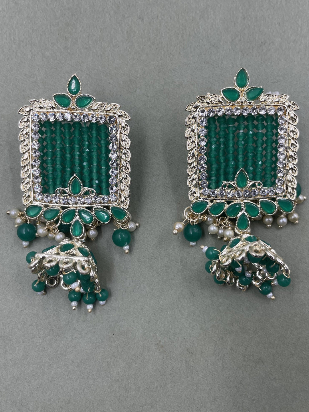 

Rhymee Gold-Plated Kundan-Studded & Beaded Jhumkas