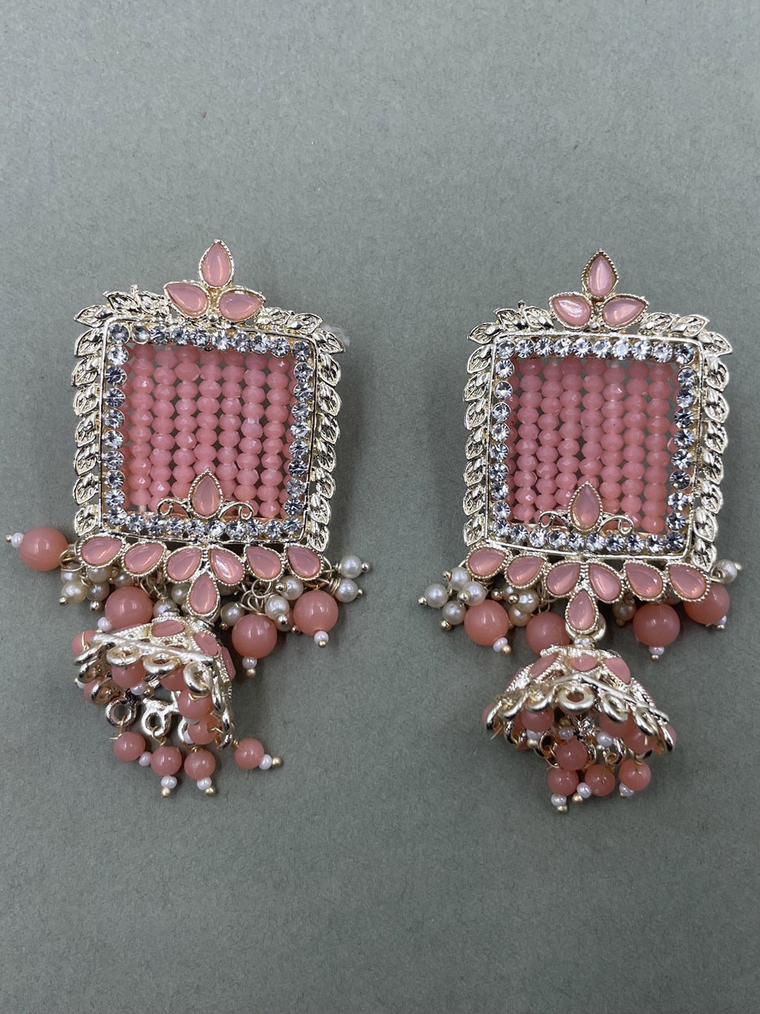 

Rhymee Gold-Plated Kundan-Studded & Beaded Jhumkas