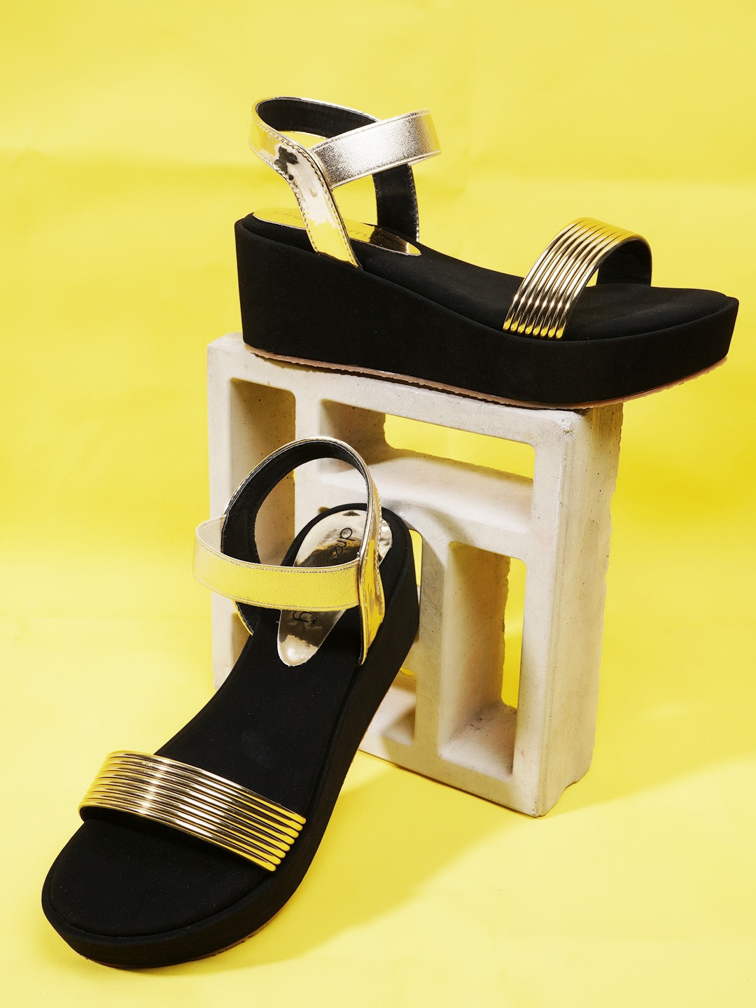 

DressBerry Gold-Toned And Black Striped Wedge Heels