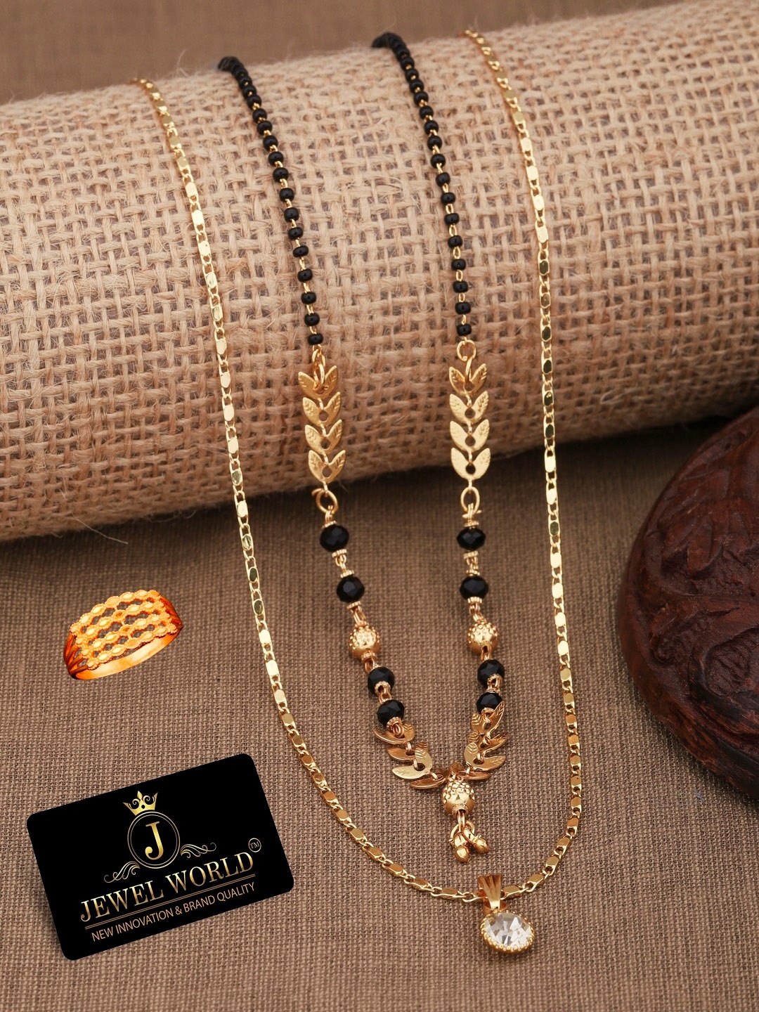 

JEWEL WORLD Gold-Plated Stone Studded & Beaded Mangalsutra With Chain & Ring