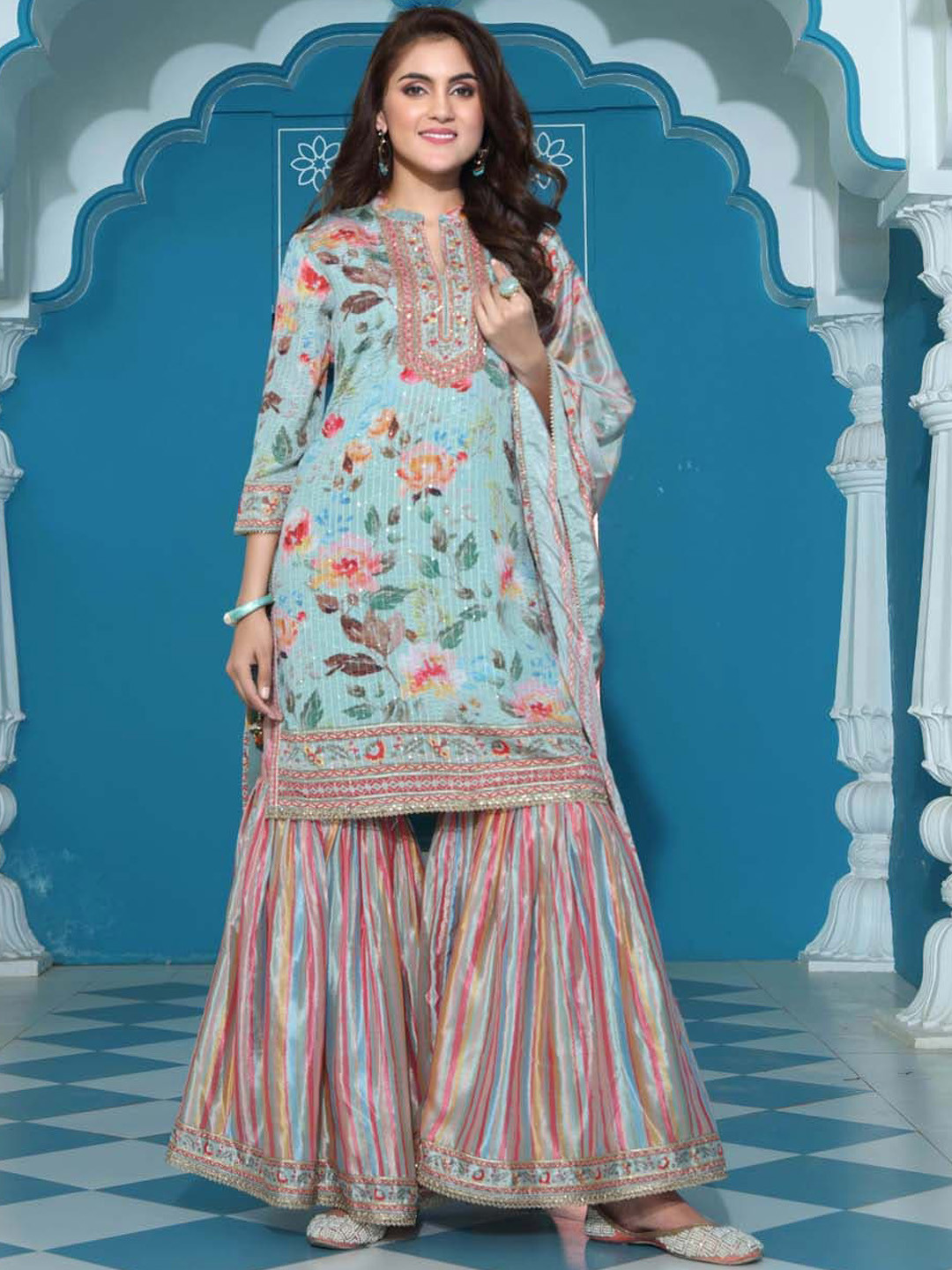 

Meena Bazaar Floral Printed Regular Beads And Stones Kurti With Sharara & Dupatta, Blue