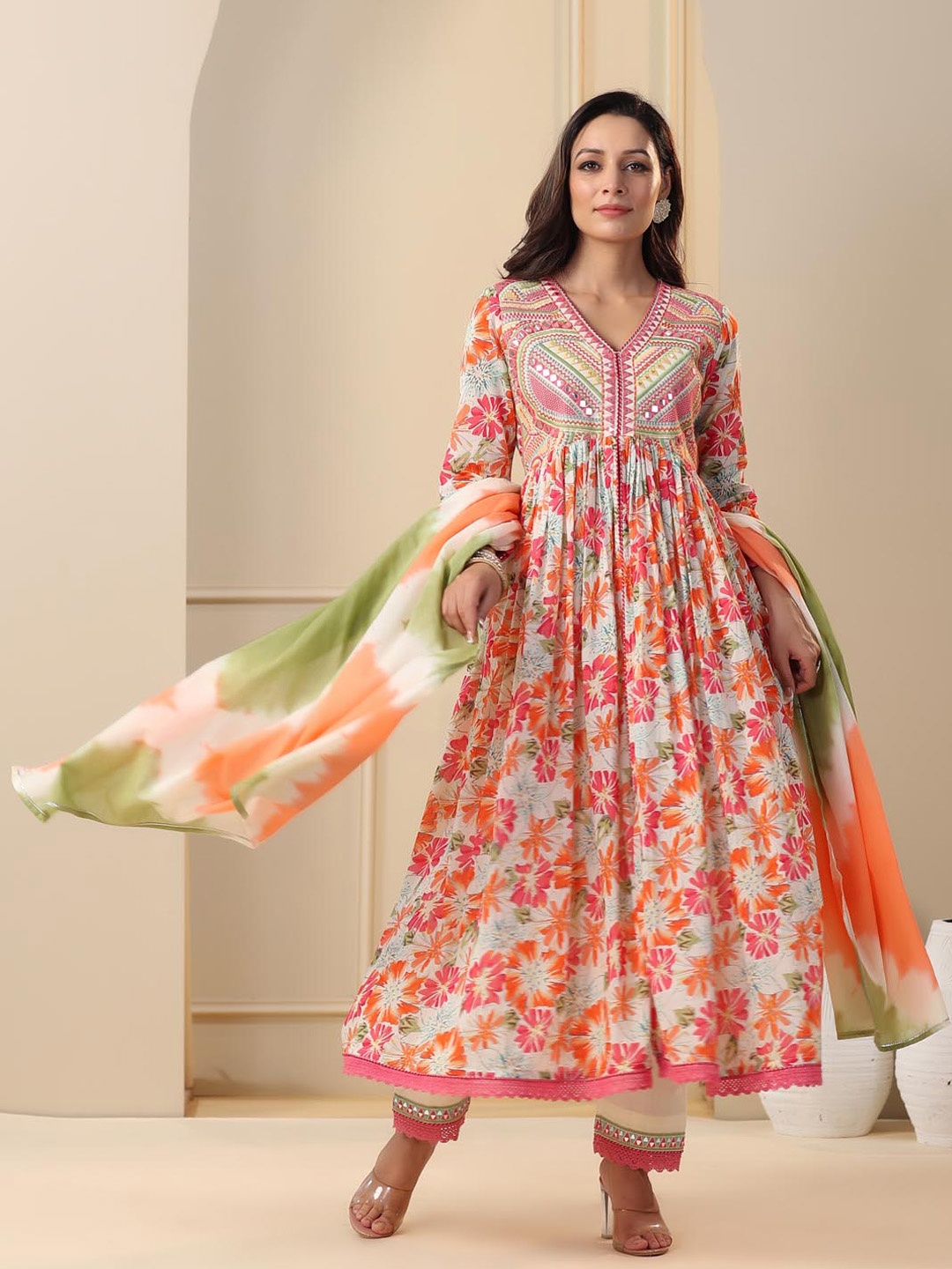 

Meena Bazaar Ethnic Motifs Printed Pleated Mirror Work Kurta with Trousers & Dupatta, Orange