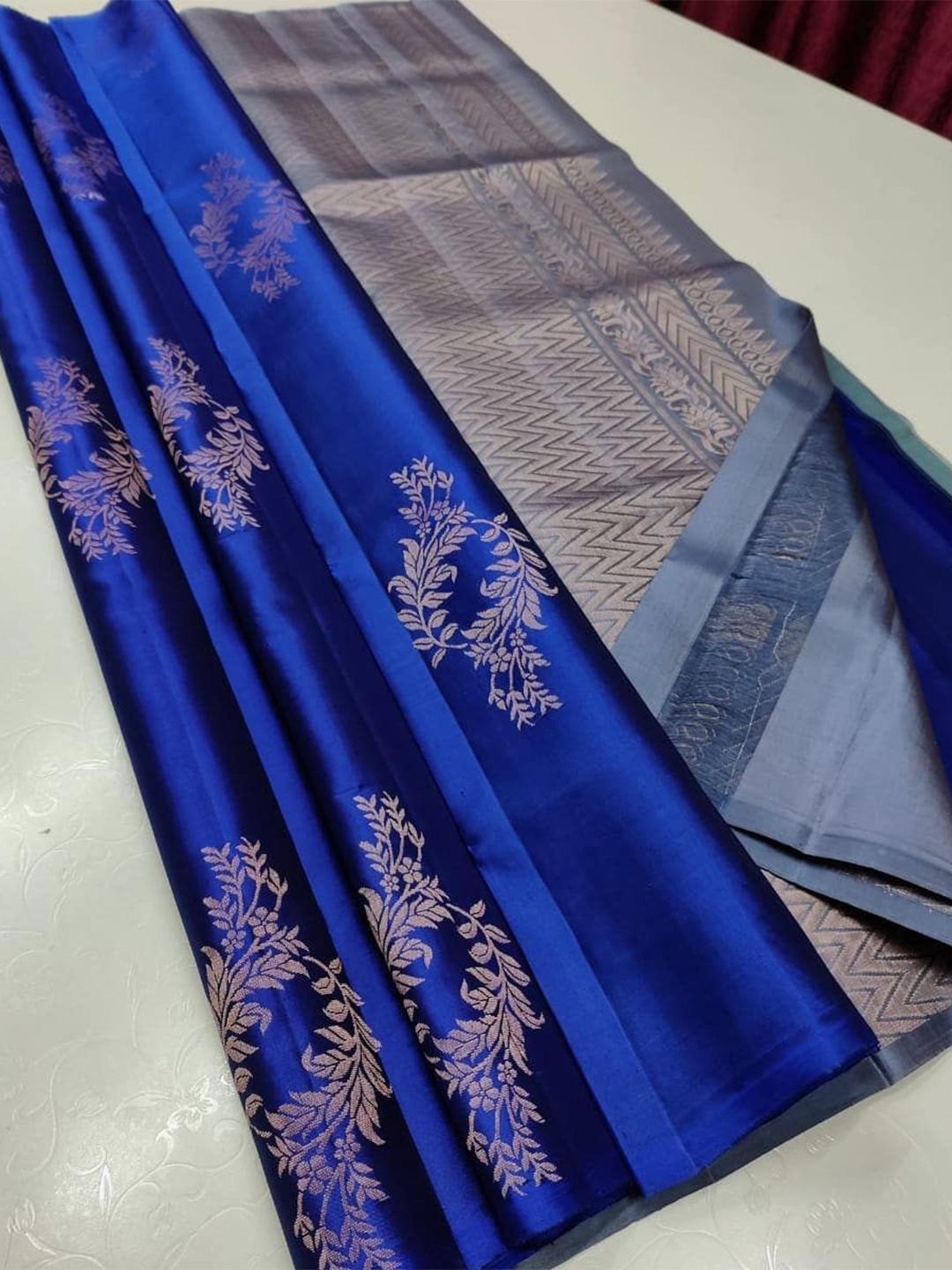 

DIVASTRI Blue & Silver-Toned Woven Design Zari Banarasi Saree