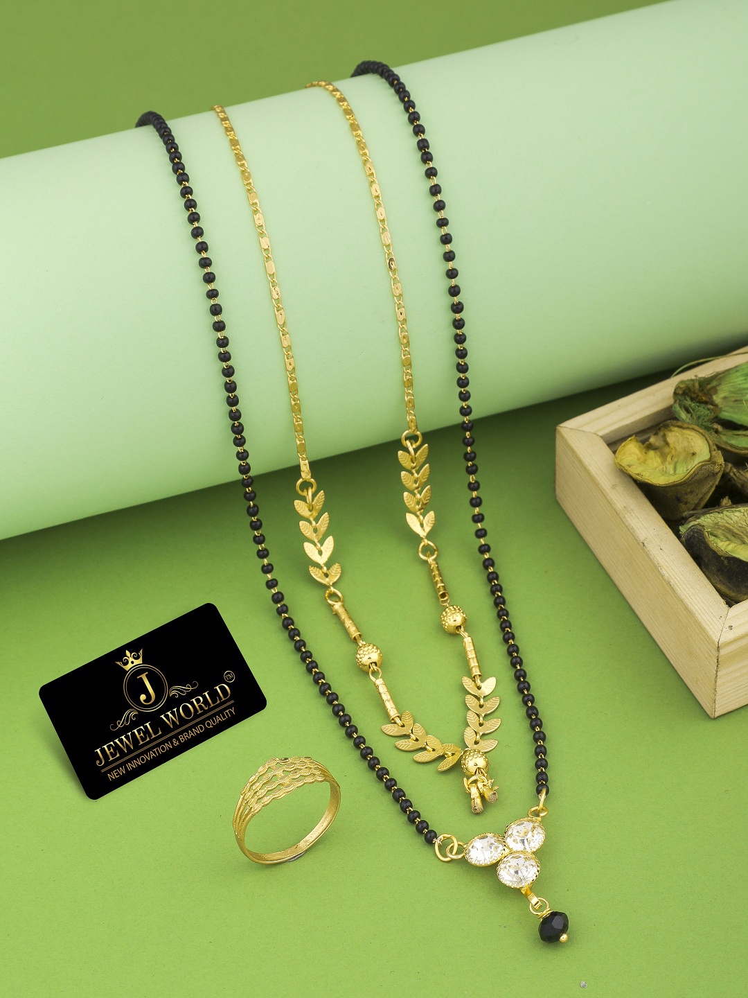 

JEWEL WORLD Gold-Plated Stone Studded & Beaded Mangalsutra With Chain & Ring