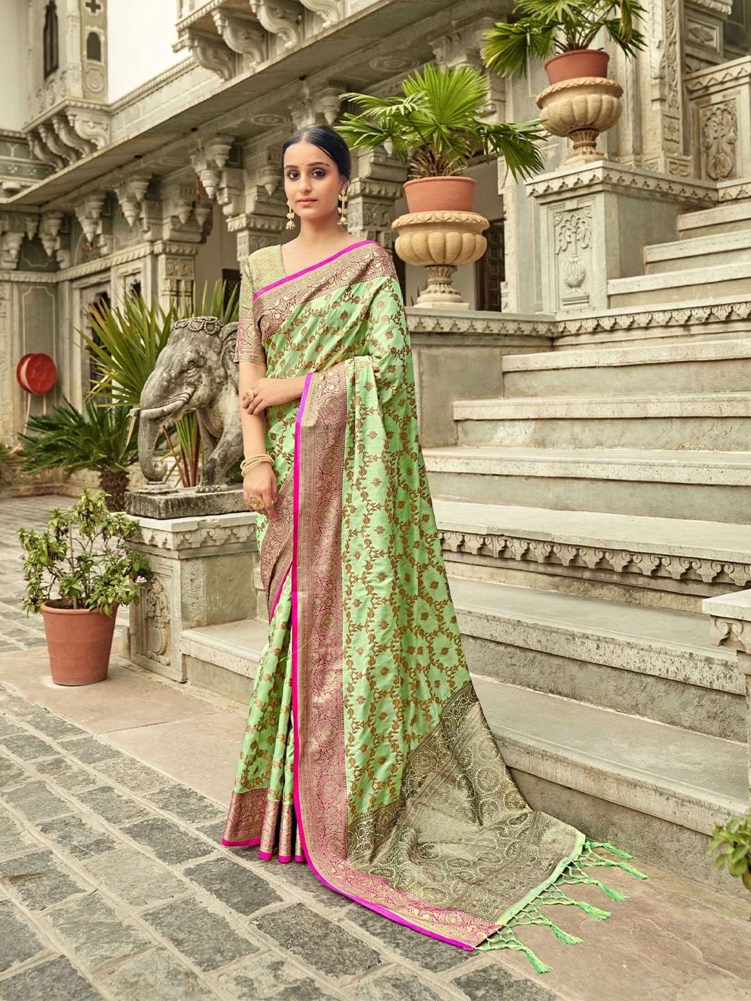 

Mitera Green & Pink Woven Design Zari Traditional Banarasi Saree