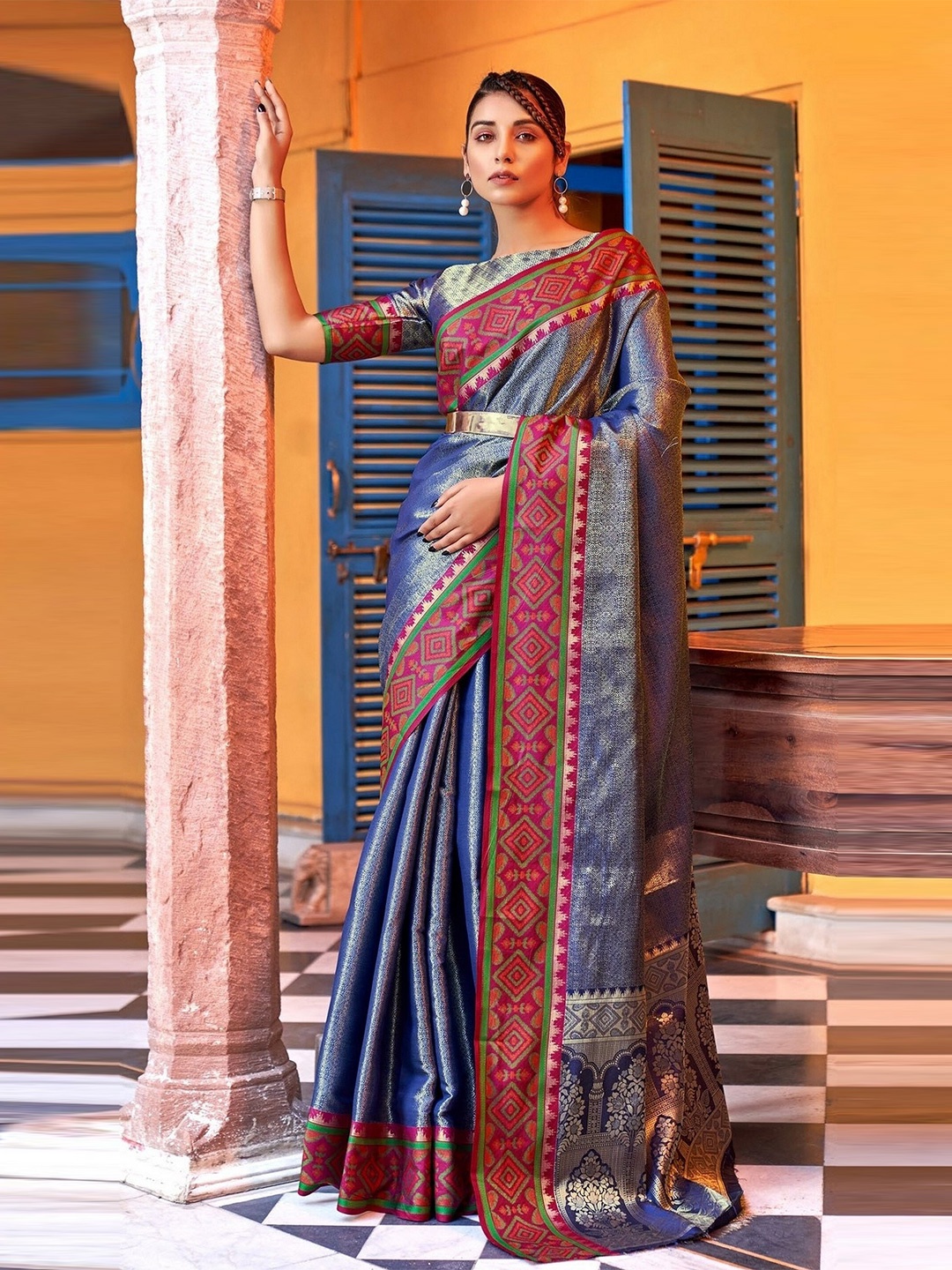 

Mitera Navy Blue & Red Woven Design Zari Ikat Saree