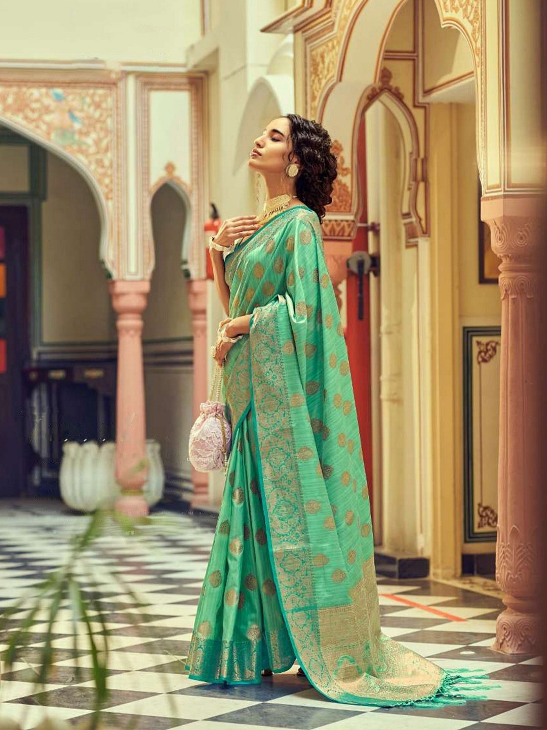 

Mitera Blue & Gold-Toned Ethnic Motif Woven Design Zari Banarasi Saree