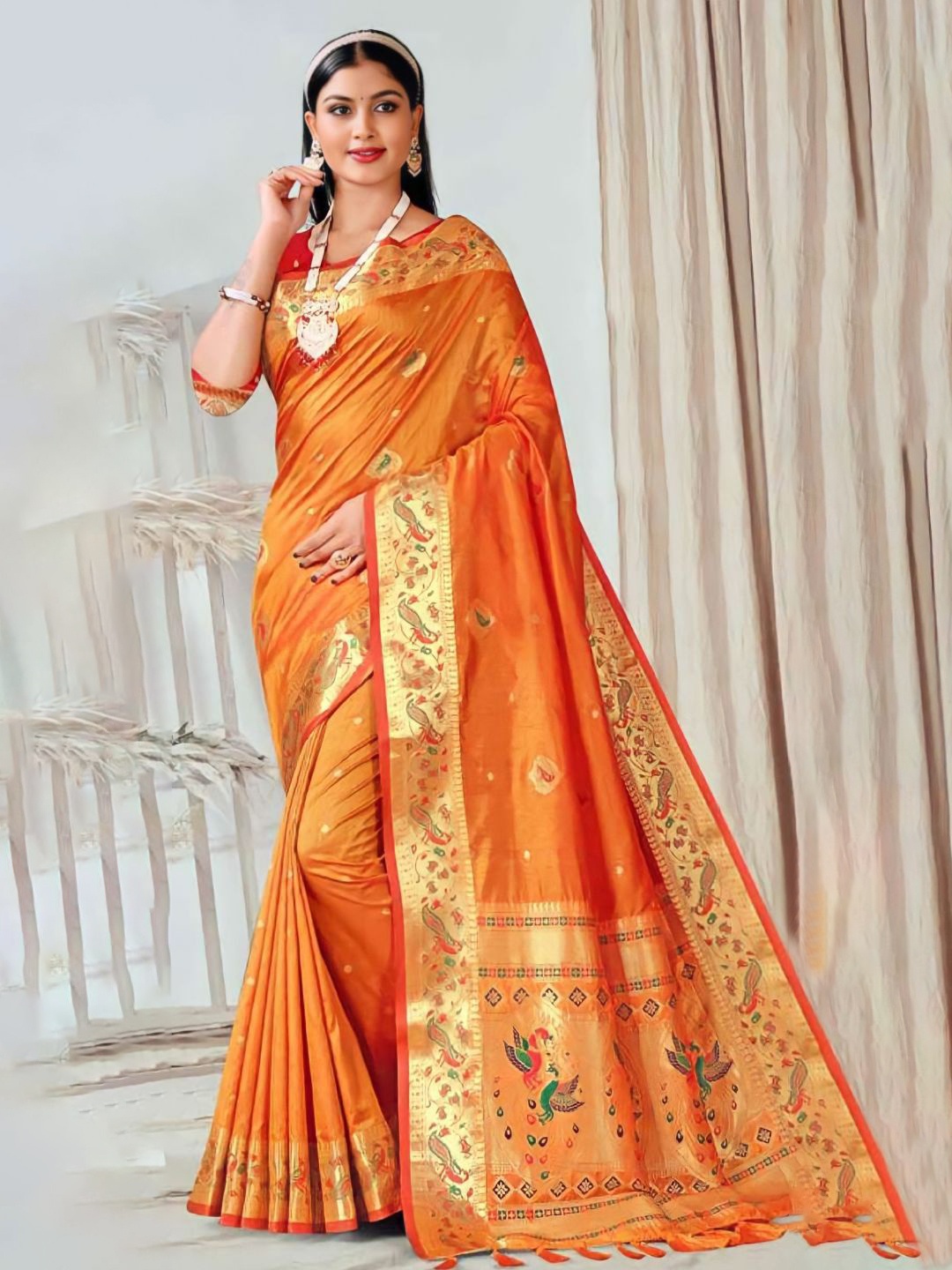 

Mitera Mustard Yellow & Gold-Toned Ethnic Motif Woven Design Zari Paithani Saree