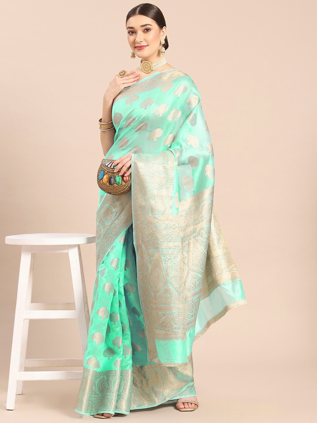 

Mitera Cream-Coloured & Silver-Toned Woven Design Zari Organza Banarasi Saree