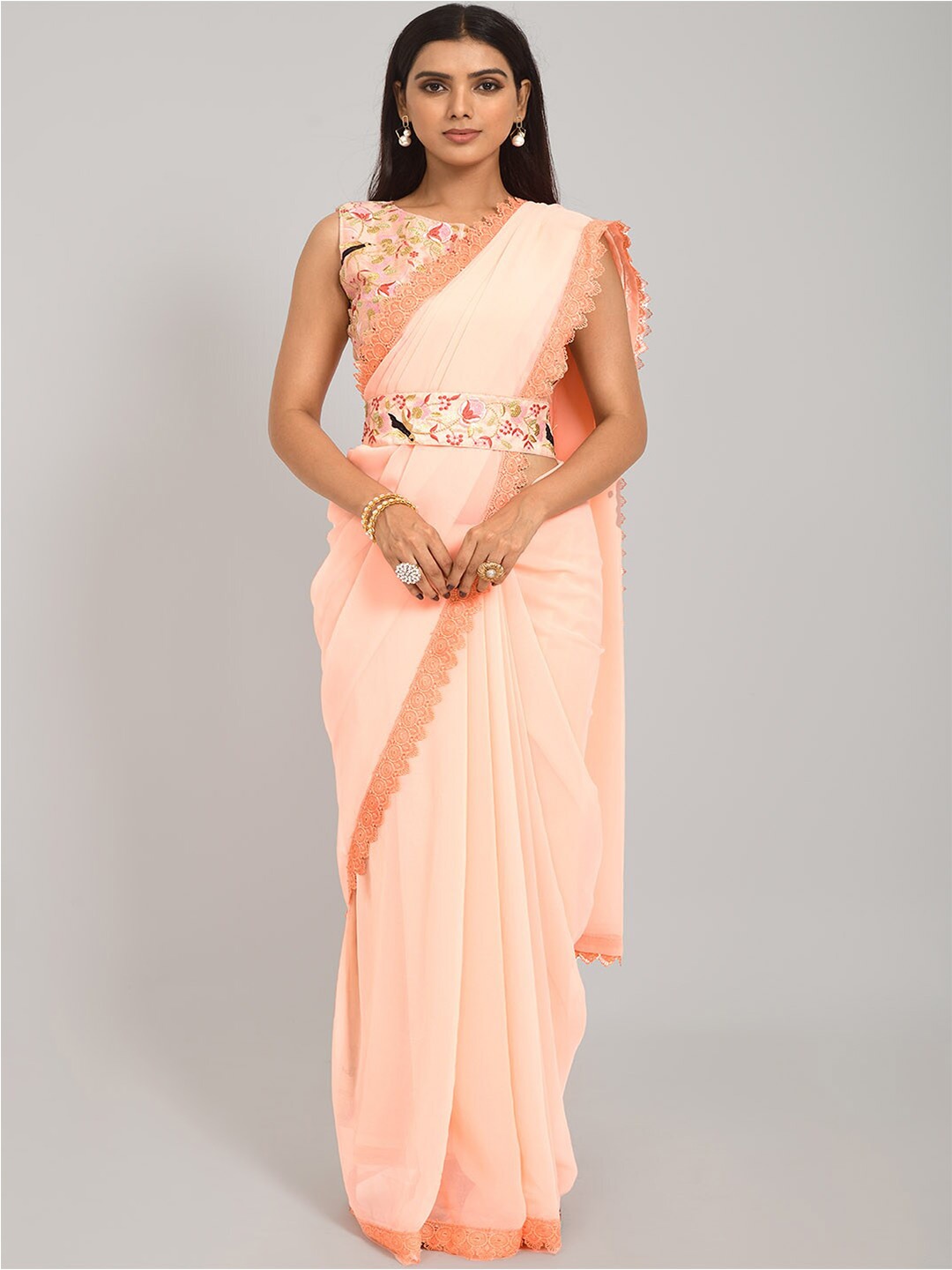 

Mitera Peach Poly Georgette Saree With Embroidered Blouse Piece