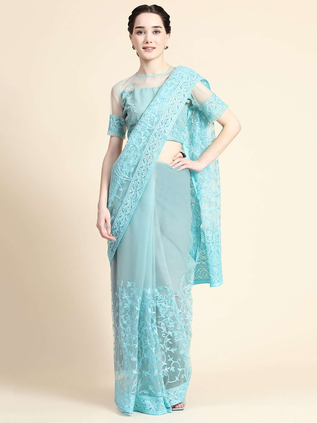

Mitera Turquoise Blue Floral Embroidered Net Saree