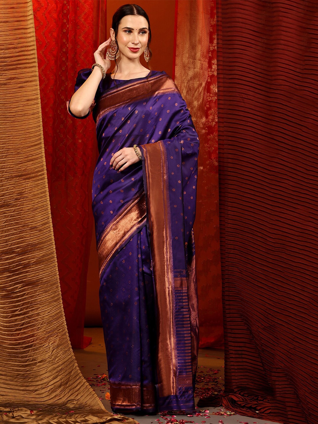 

Mitera Blue & Copper Ethnic Motif Zari Silk Blend Banarasi Saree