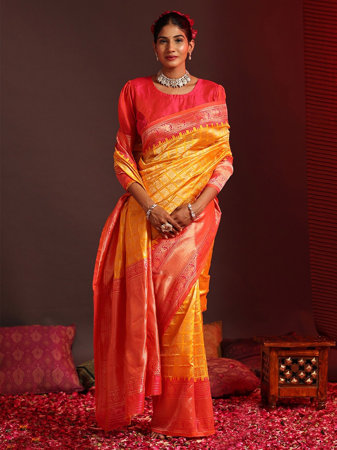 

Mitera Mustard & Red Floral Woven Design Zari Kanjeevaram Saree