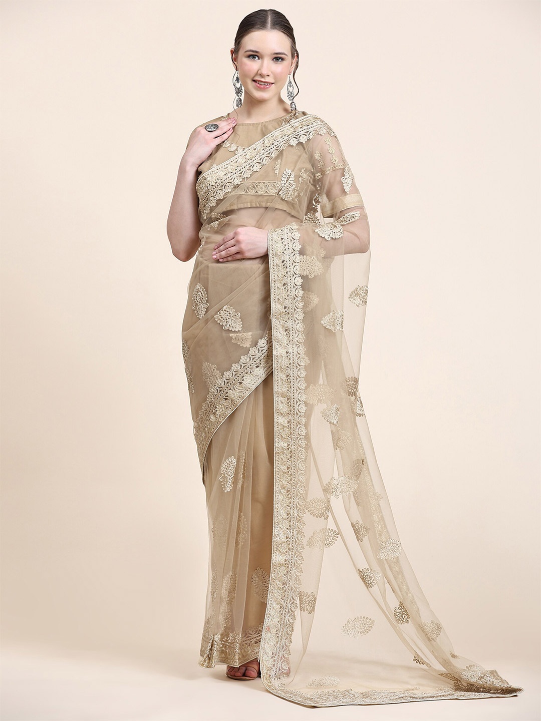

Mitera Beige Ethnic Motifs Embroidered Net Saree