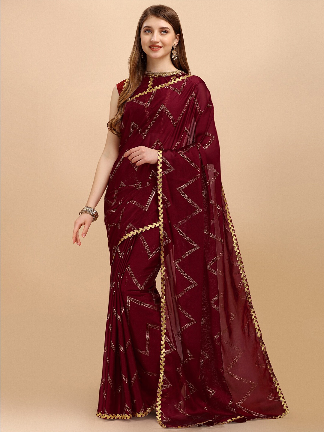 

Mitera Maroon & Gold-Toned Striped Silk Cotton Leheriya Saree