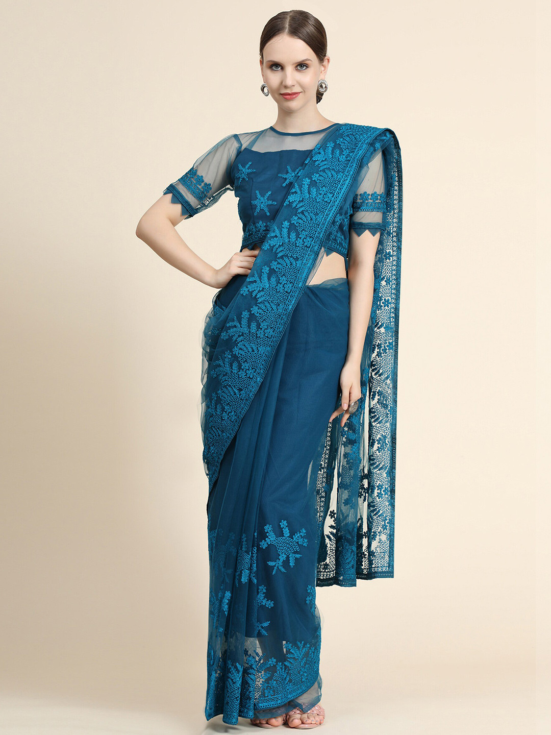 

Mitera Teal Floral Embroidered Net Saree