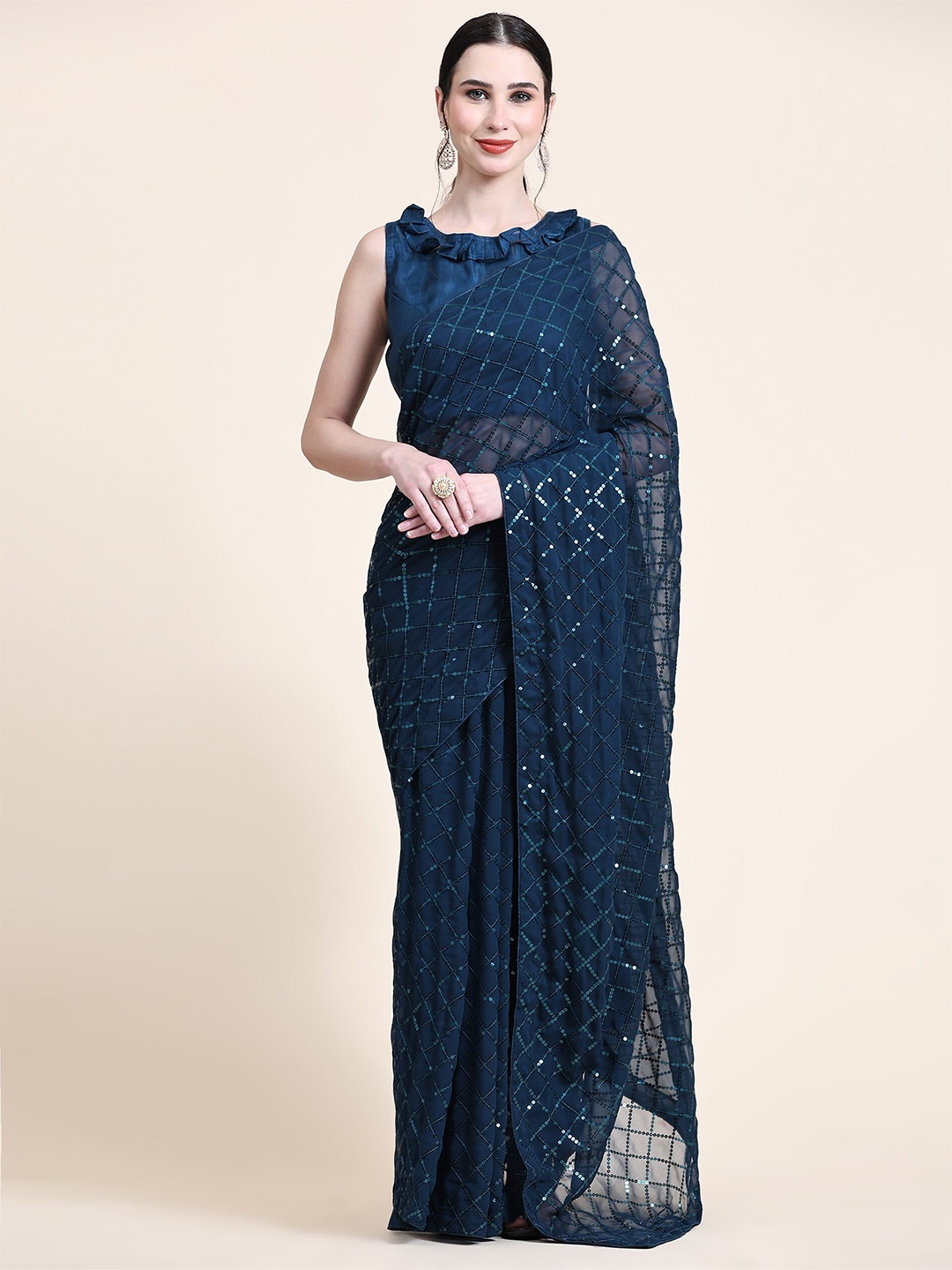 

Mitera Teal Embellished Sequinned Pure Georgette Saree