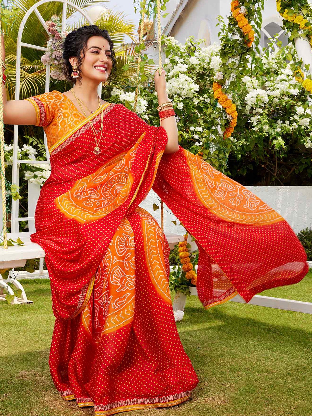

Laxmipati Red & White Polka Dot Poly Chiffon Saree