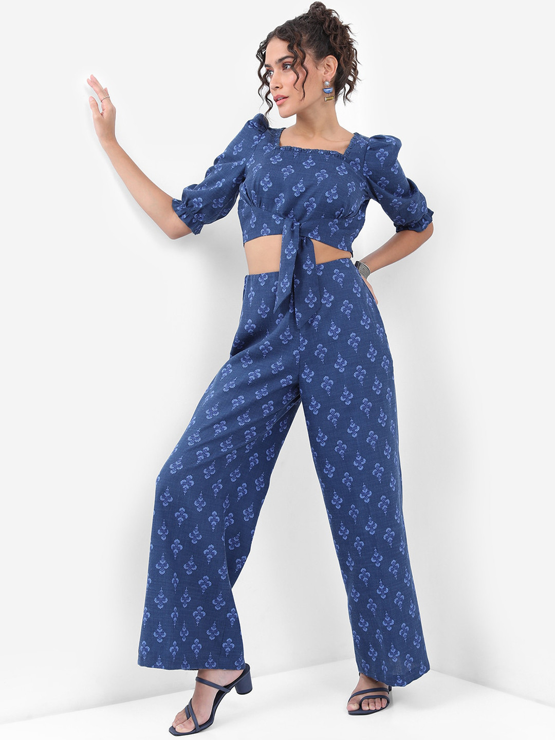 

Vishudh Navy Blue Floral Printed Puff Sleeves Tie Ups Detail Regular Top With Palazzos