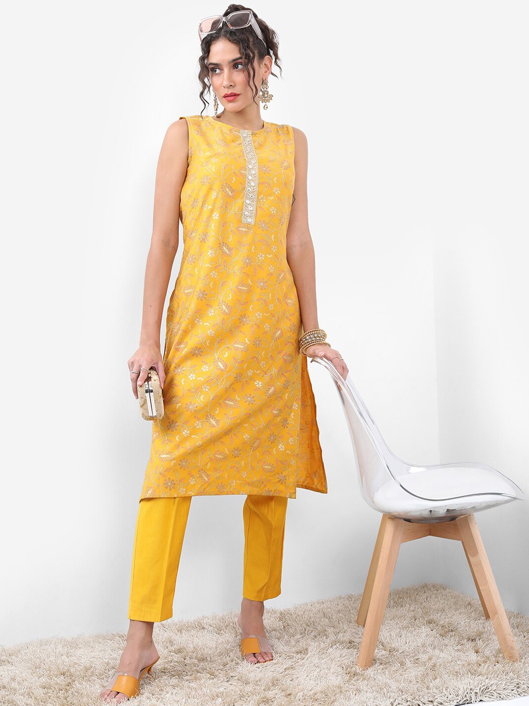 

Vishudh Yellow Ethnic Motifs Printed Sleeveless Straight Kurta With Trousers