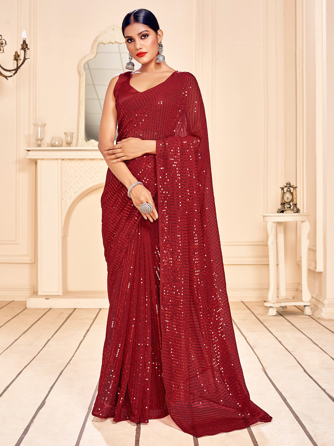 

Mitera Maroon Embellished Sequinned Pure Georgette Saree