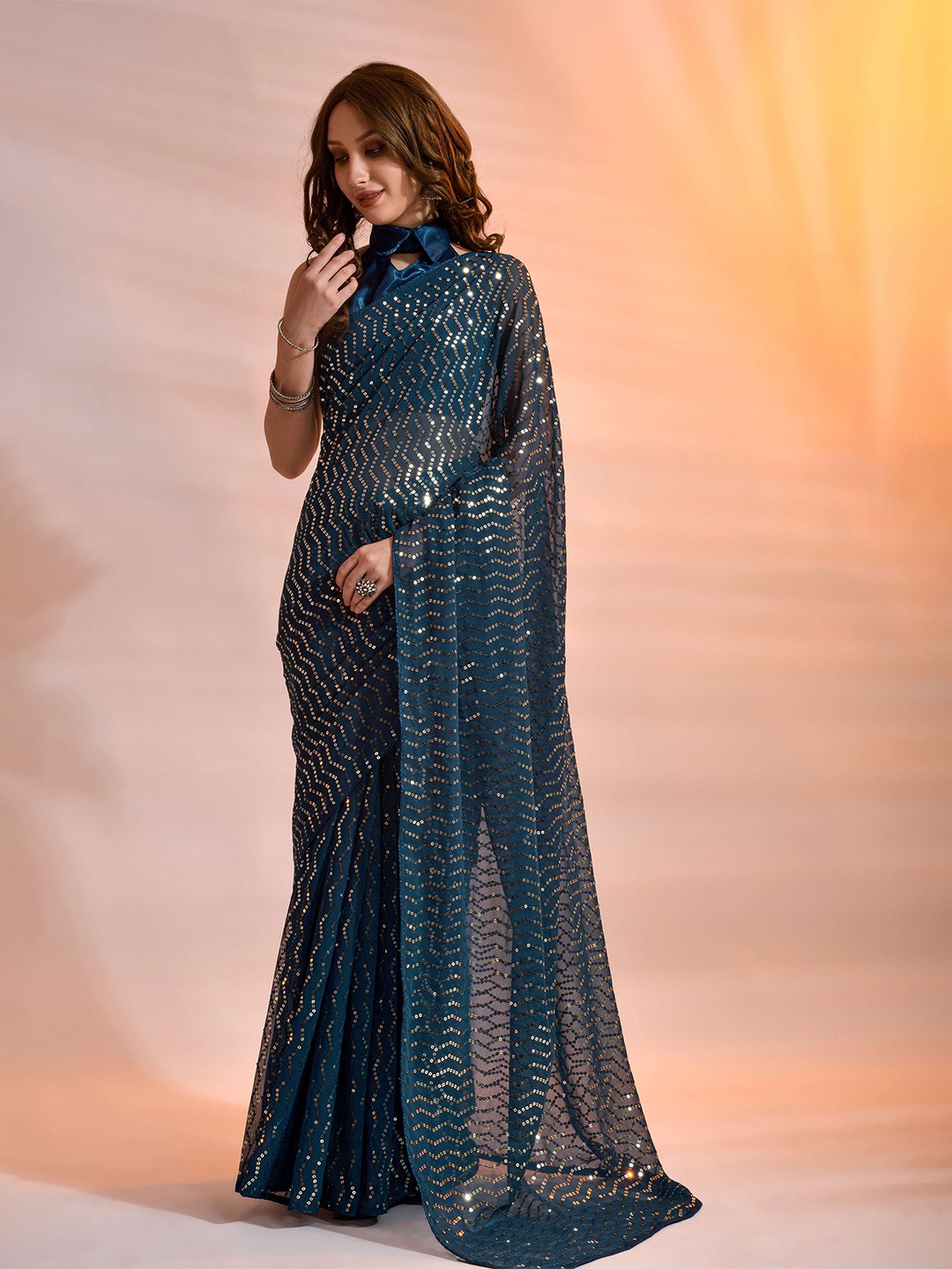 

Mitera Teal Sequin Embellished Pure Georgette Saree