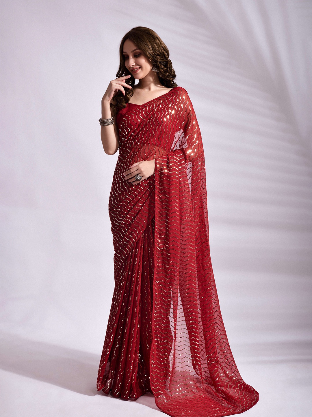 

Mitera Red Embellished Sequinned Pure Georgette Saree