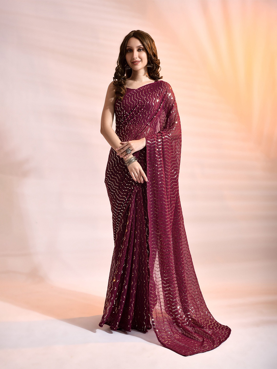 

Mitera Purple Embellished Sequinned Pure Georgette Saree