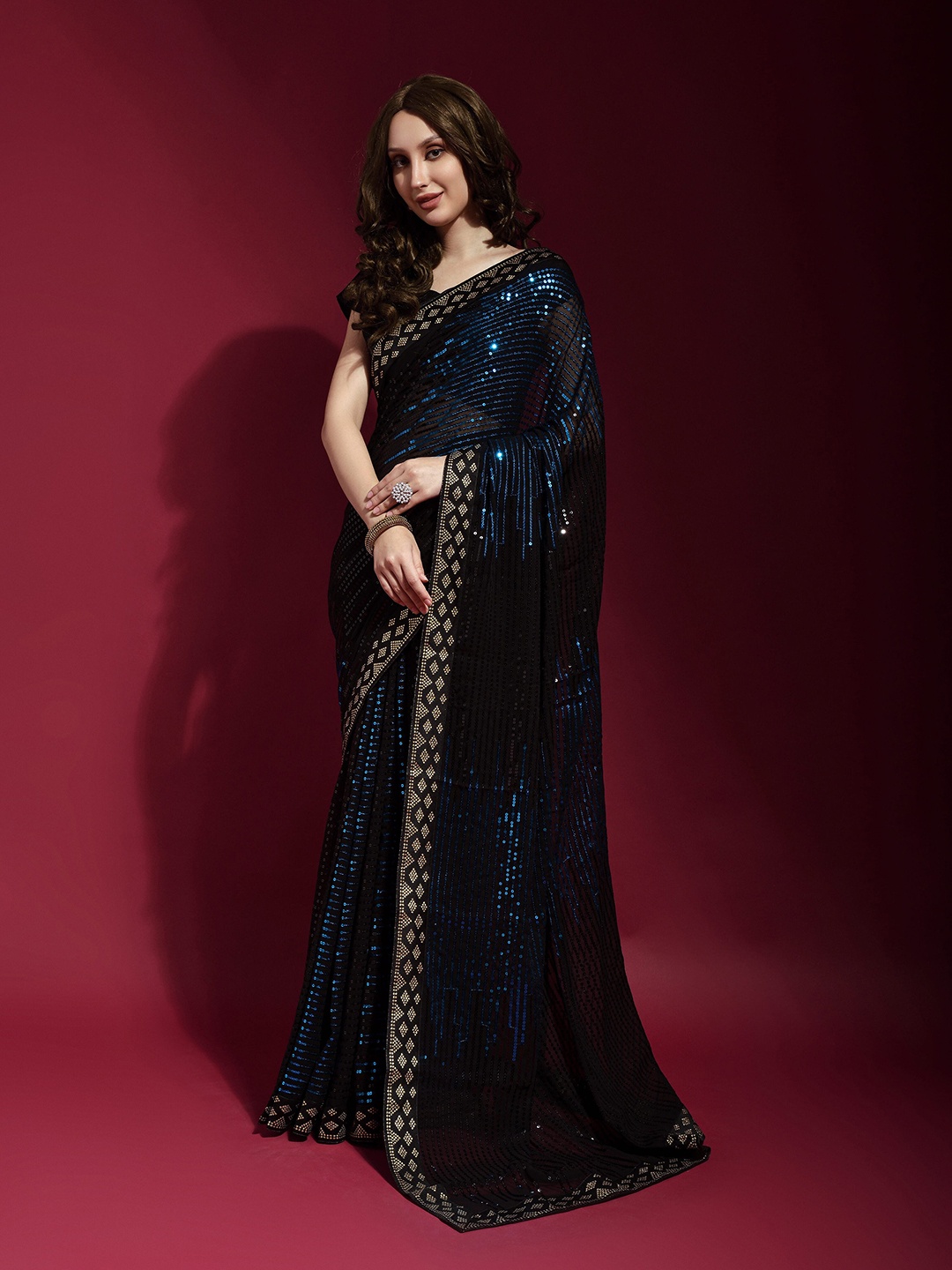 

Mitera Navy Blue & Black Embellished Sequinned Pure Georgette Saree