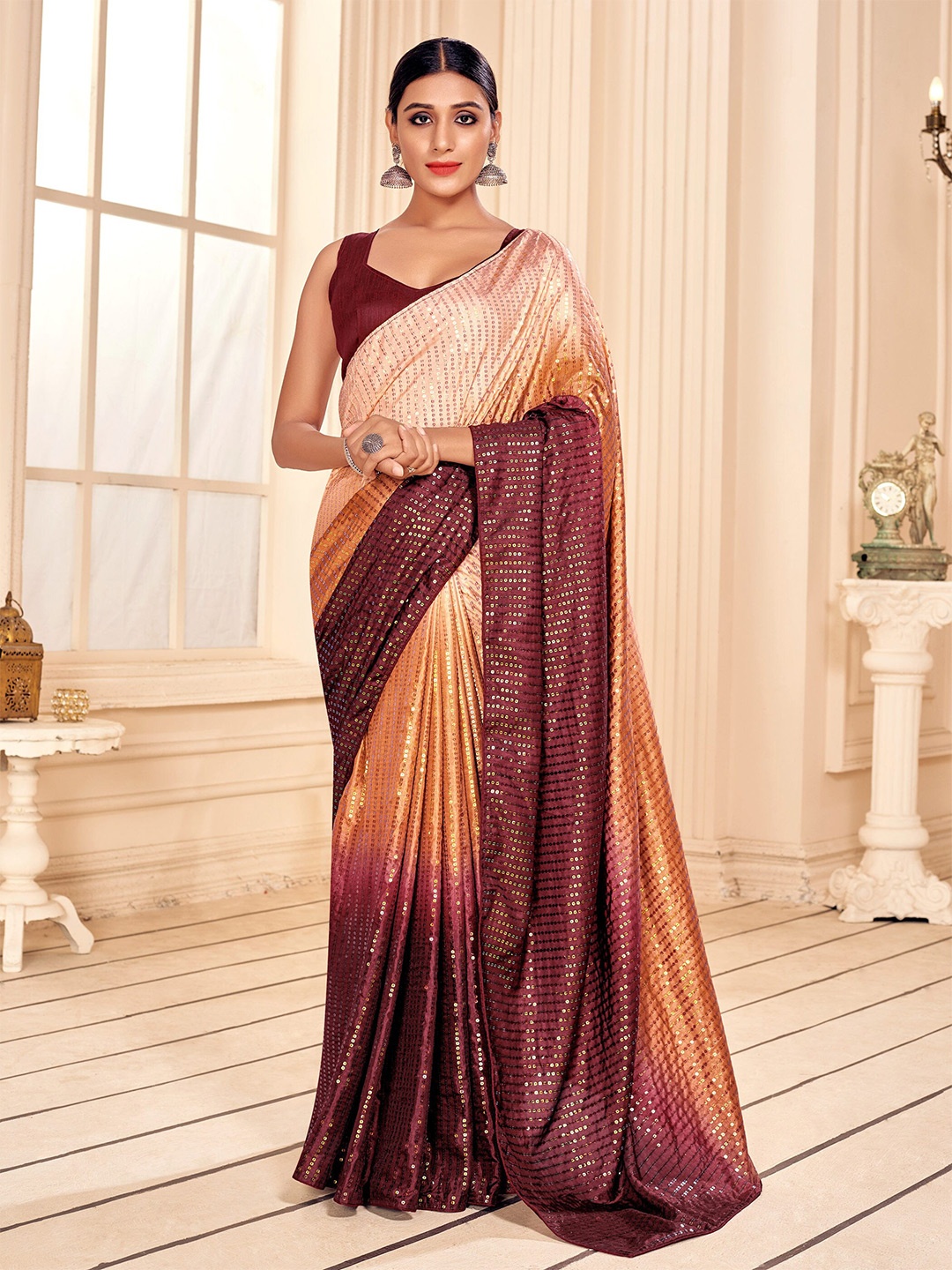 

Mitera Gold-Toned & Magenta Embellished Sequinned Saree