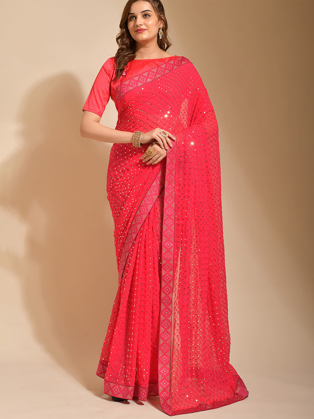 

Mitera Pink & Gold Embellished Sequinned Pure Georgette Saree