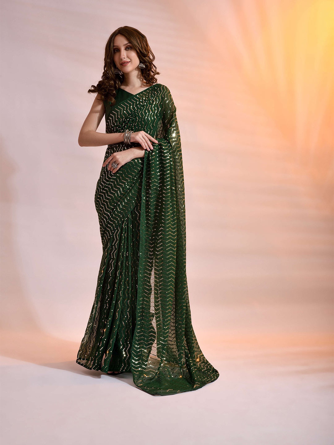 

Mitera Green Sequinned Pure Georgette Saree