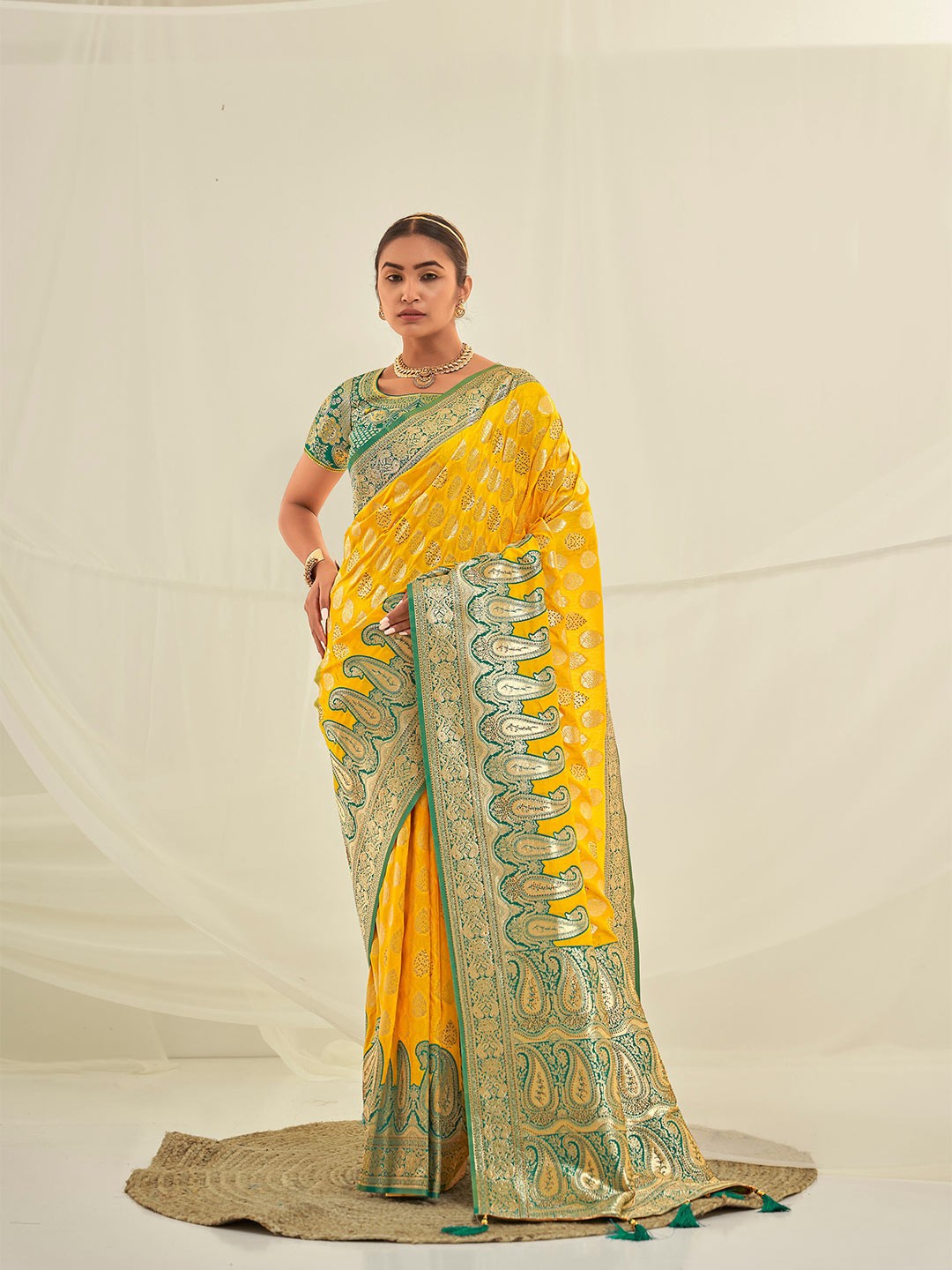 

Mitera Yellow Ethnic Motifs Woven Design Zari Saree
