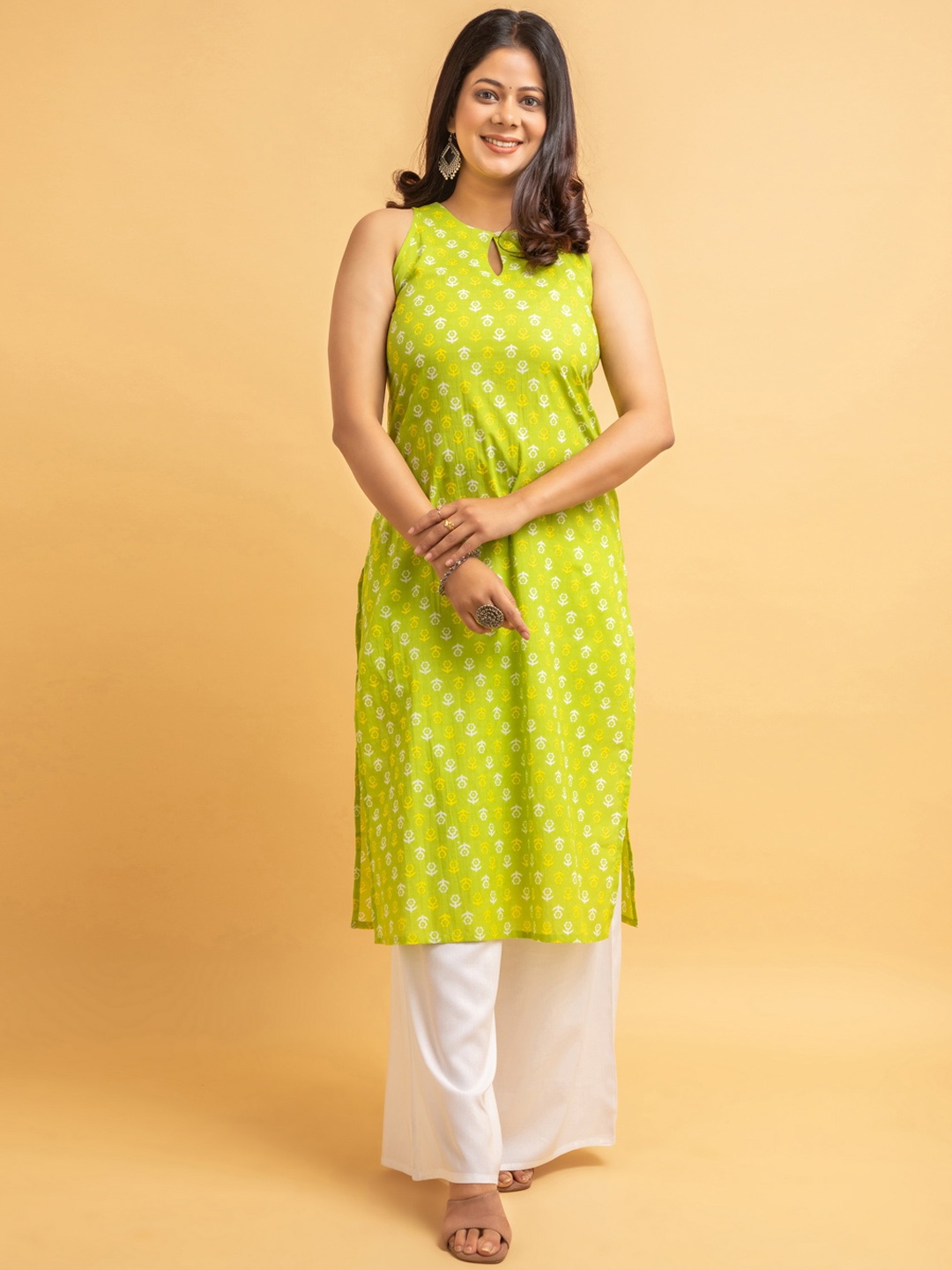 

SUTI Keyhole Neck Ethnic Motifs Printed Kurta, Yellow
