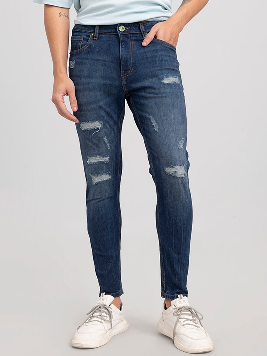 

Snitch Men Blue Skinny Fit Mildly Distressed Light Fade Stretchable Jeans