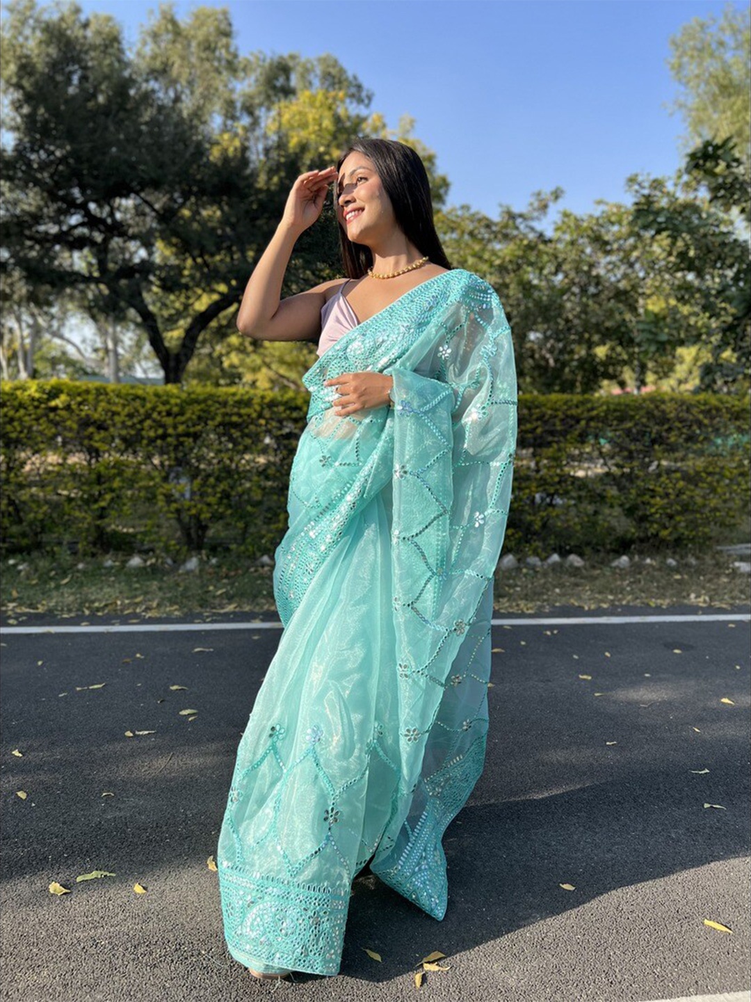 

Atulyam Tex World Ethnic Motifs Embellished Sequinned Saree, Turquoise blue