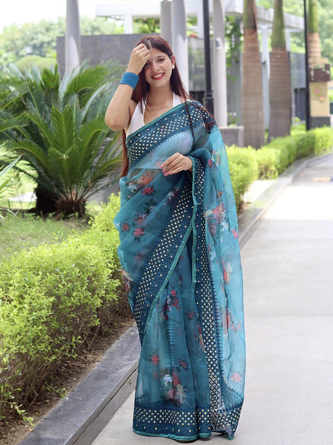 

Atulyam Tex World Floral Printed Embroidered Border Organza Saree, Teal