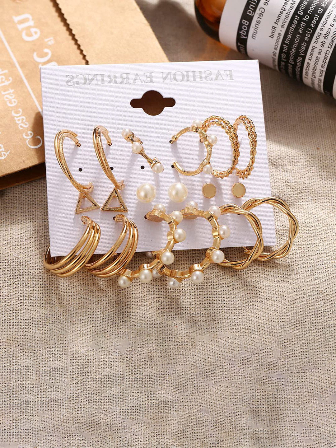 

Arzonai Gold-Toned Contemporary Studs Earrings