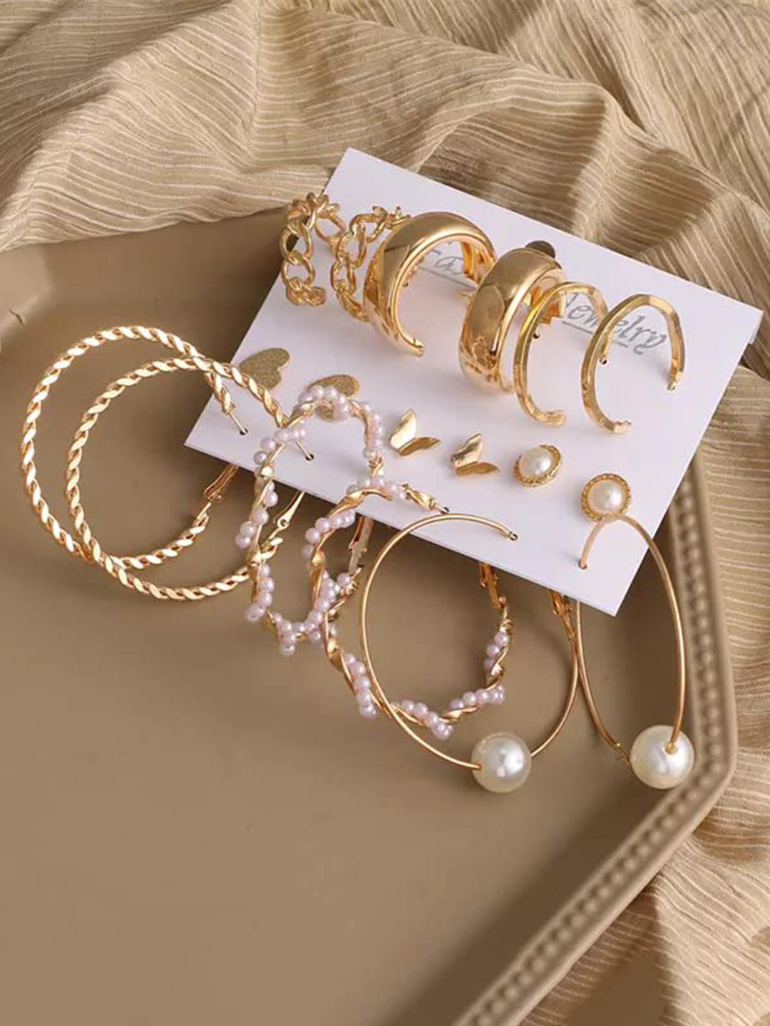 

Arzonai Gold-Toned Contemporary Drop Earrings